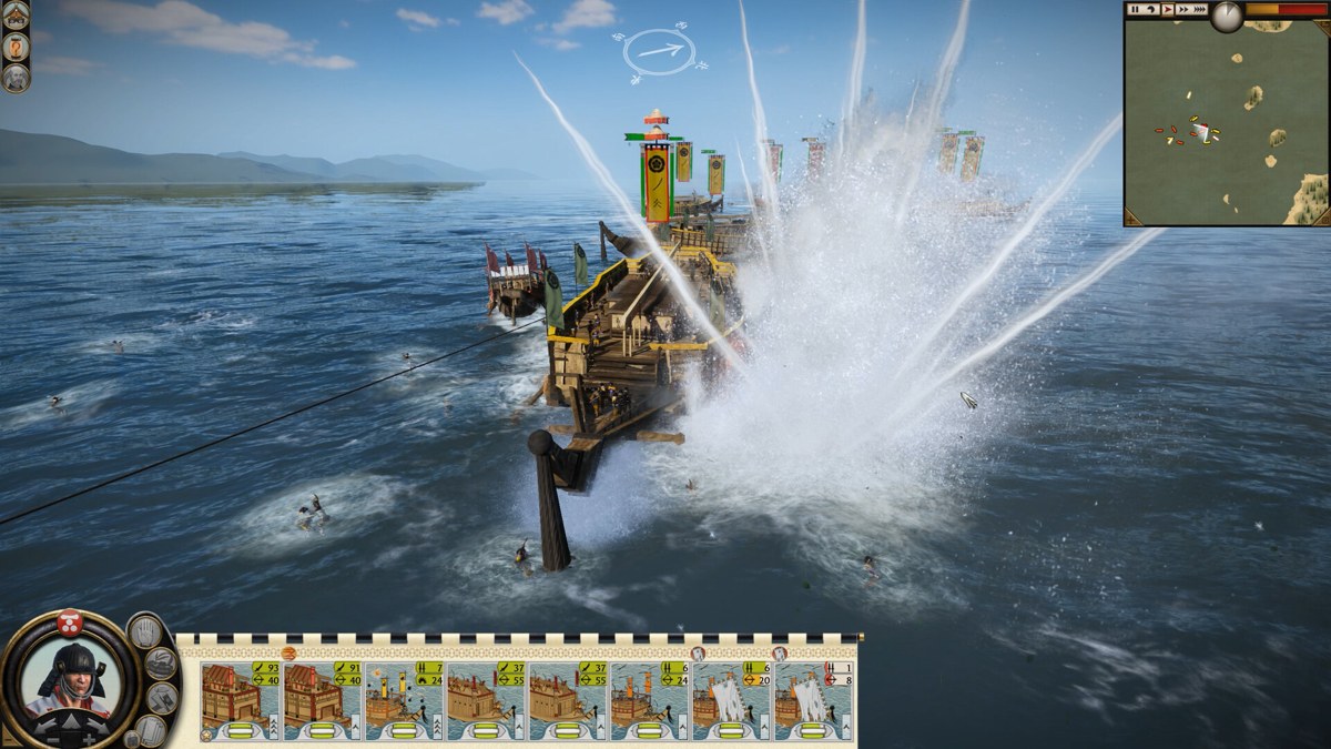 Total War: Shogun 2 naval battle with a warship firing across the open sea